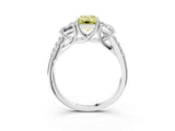 White gold Three-Stone Fancy Yellow Emerald Cut Diamond Ring with Pavé Band and Prong Setting_144