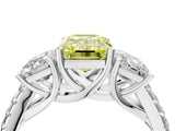 White gold Three-Stone Fancy Yellow Emerald Cut Diamond Ring with Pavé Band and Prong Setting_145