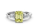 White gold Three-Stone Fancy Yellow Emerald Cut Diamond Ring with Pear  Side Stones in Four-Prong Setting_12