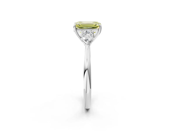 White gold Three-Stone Fancy Yellow Emerald Cut Diamond Ring with Pear  Side Stones in Four-Prong Setting