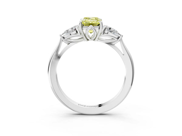 White gold Three-Stone Fancy Yellow Emerald Cut Diamond Ring with Pear  Side Stones in Four-Prong Setting