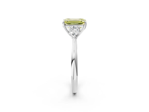 White gold Three-Stone Fancy Yellow Emerald Cut Diamond Ring with Pear  Side Stones in Four-Prong Setting