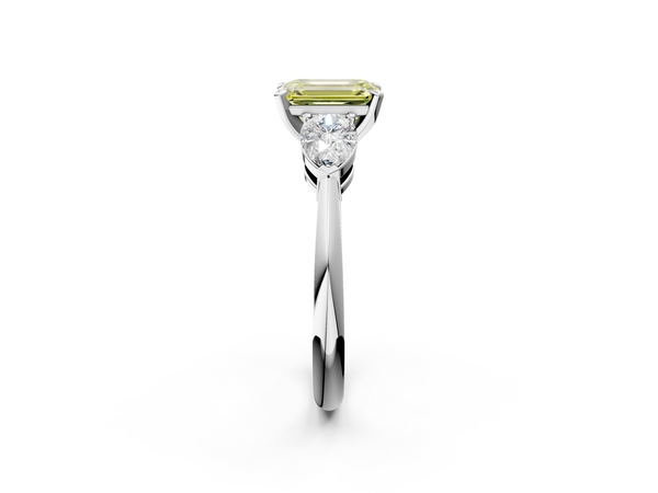 White gold Three-Stone Fancy Yellow Emerald Cut Diamond Ring with Pear Side Stones and Four-Prong Setting