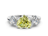 White gold Three-Stone Fancy Yellow Heart Cut Cut Diamond Ring with Channel Set Band and Four-Prong Setting_36