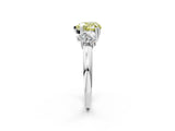 White gold Three-Stone Fancy Yellow Heart Cut Cut Diamond Ring with Channel Set Band and Four-Prong Setting_38