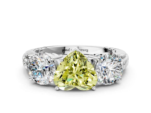 White gold Three-Stone Fancy Yellow Heart Cut Cut Diamond Ring with Channel-Set Band and Prong Setting