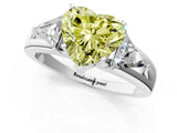 White gold Three-Stone Fancy Yellow Heart Cut Cut Diamond Ring with Trillion Side Stones on a Split Shank Band_13