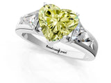 White gold Three-Stone Fancy Yellow Heart Cut Cut Diamond Ring with Trillion Side Stones on a Split Shank Band_1