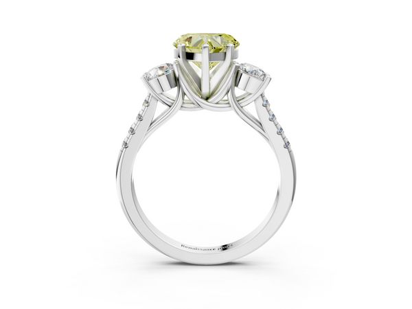 Platinum Three-Stone Fancy Yellow Heart Cut Diamond Pavé Band with Four-Prong Setting