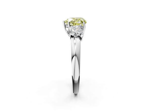 White gold Fancy Yellow Heart Cut Diamond Three-Stone Ring with Four-Prong Setting and Classic Band