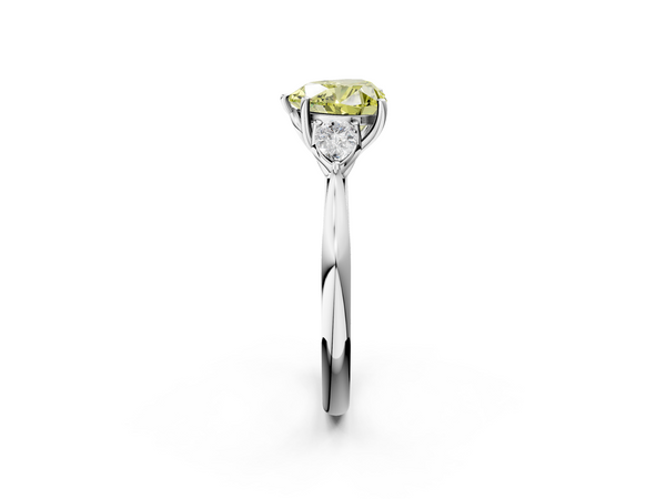 Platinum Three-Stone Fancy Yellow Heart  Cut Diamond Ring with Pear Side Stones in Four-Prong Setting