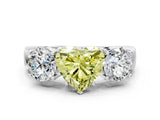 White gold Three-Stone Fancy Yellow Heart Cut Diamond Ring with Round Side Stones, Classic Band, and Four-Prong Setting_18