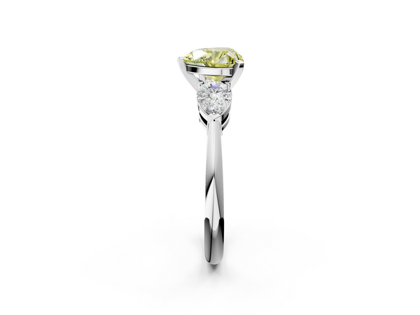 White gold Three-Stone Fancy Yellow Heart Cut Diamond Ring with Pear Side Stones and Four-Prong Setting