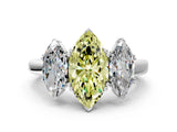 White gold Three-Stone Fancy Yellow Marquise Cut Cut Diamond Ring with Channel Set Band and Four-Prong Setting_12