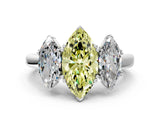White gold Three-Stone Fancy Yellow Marquise Cut Cut Diamond Ring with Channel Set Band and Four-Prong Setting_36