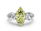 White gold Three-Stone Fancy Yellow Marquise Cut Cut Diamond Ring with Channel-Set Band and Prong Setting