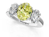 White gold Three-Stone Fancy Yellow Oval Cut Cut Diamond Ring with Channel Set Band and Four-Prong Setting_14