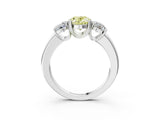 White gold Three-Stone Fancy Yellow Oval Cut Cut Diamond Ring with Channel Set Band and Four-Prong Setting_15