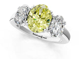White gold Three-Stone Fancy Yellow Oval Cut Cut Diamond Ring with Channel Set Band and Four-Prong Setting_37