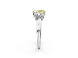 White gold Three-Stone Fancy Yellow Oval Cut Cut Diamond Ring with Channel Set Band and Four-Prong Setting_38
