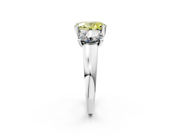 Platinum Three-Stone Fancy Yellow Oval Cut Cut Solitaire Ring with Classic Prong Setting