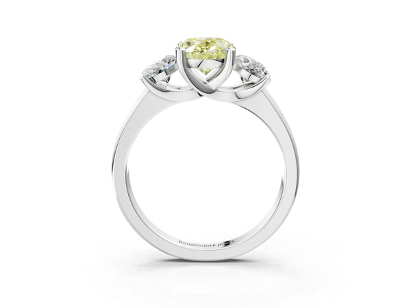 Platinum Three-Stone Fancy Yellow Oval Cut Cut Solitaire Ring with Classic Prong Setting