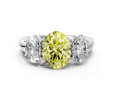 White gold Three-Stone Fancy Yellow Oval  Cut Diamond Ring with Channel-Set Band and Four-Prong Setting_60