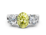 White gold Three-Stone Fancy Yellow Oval Cut Diamond Ring with Round Side Stones, Classic Band, and Four-Prong Setting_12
