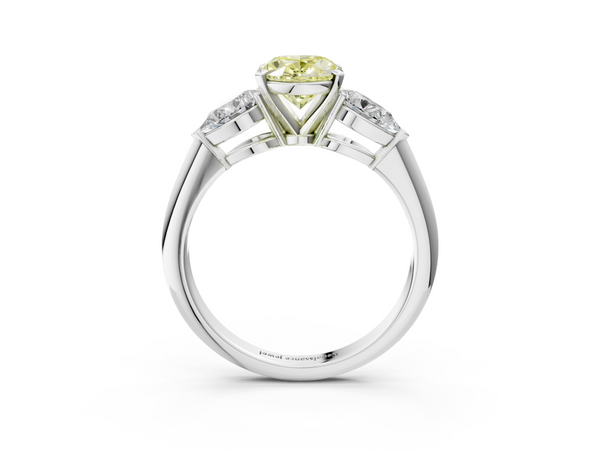 Platinum Three-Stone Fancy Yellow Oval Cut Diamond Ring with Pear Side Stones and Four-Prong Setting