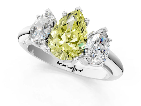 White gold Three-Stone Fancy Yellow Pear Cut Cut Diamond Engagement Ring with Prong Setting on a White Gold Band