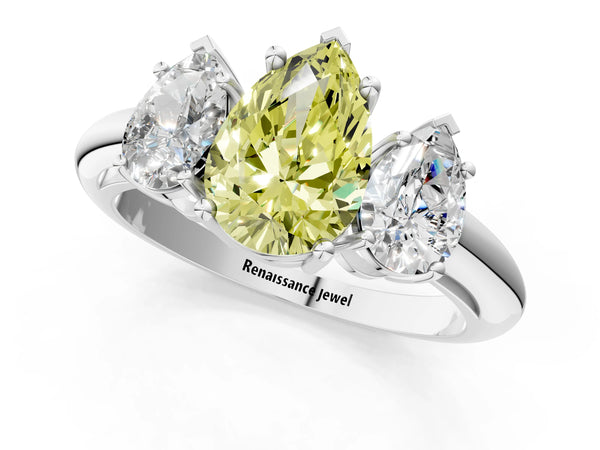 White gold Three-Stone Fancy Yellow Pear Cut Cut Diamond Engagement Ring with Prong Setting on a White Gold Band