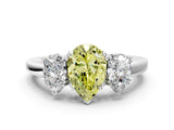 White gold Three-Stone Fancy Yellow Pear Cut Cut Diamond Ring with Channel Set Band and Four-Prong Setting_12