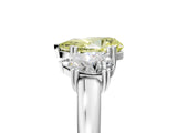 White gold Three-Stone Fancy Yellow Pear Cut Cut Diamond Ring with Channel Set Band and Four-Prong Setting_17