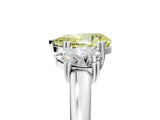 White gold Three-Stone Fancy Yellow Pear Cut Cut Diamond Ring with Channel Set Band and Four-Prong Setting_41