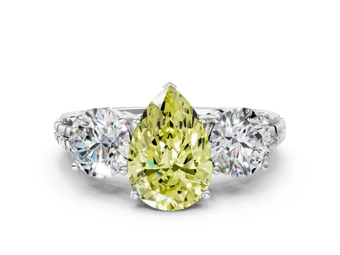 White gold Three-Stone Fancy Yellow Pear Cut Cut Diamond Ring with Channel-Set Band and Prong Setting