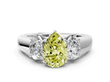 White gold Three-Stone Fancy Yellow Pear Cut Cut Diamond Ring with Prong Setting and Classic Band