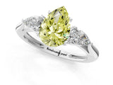 White gold Three-Stone Fancy Yellow Pear Cut Diamond Ring with Pear  Side Stones in Four-Prong Setting_13