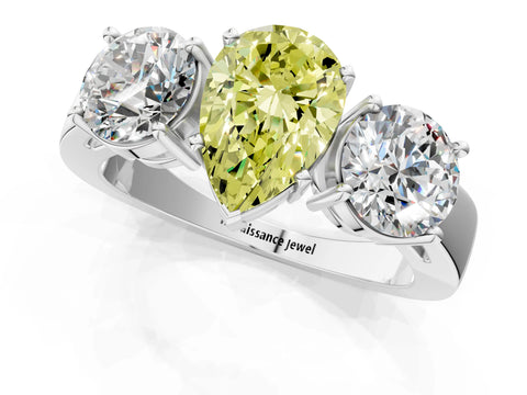 White gold Three-Stone Fancy Yellow Pear Cut Diamond Ring with Round Side Stones, Classic Band, and Four-Prong Setting_1