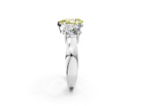 White gold Three-Stone Fancy Yellow Pear Cut Diamond Ring with Round Side Stones, Classic Band, and Four-Prong Setting_2