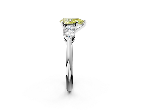 Platinum Three-Stone Fancy Yellow Pear Cut Diamond Ring with Pear Side Stones and Four-Prong Setting