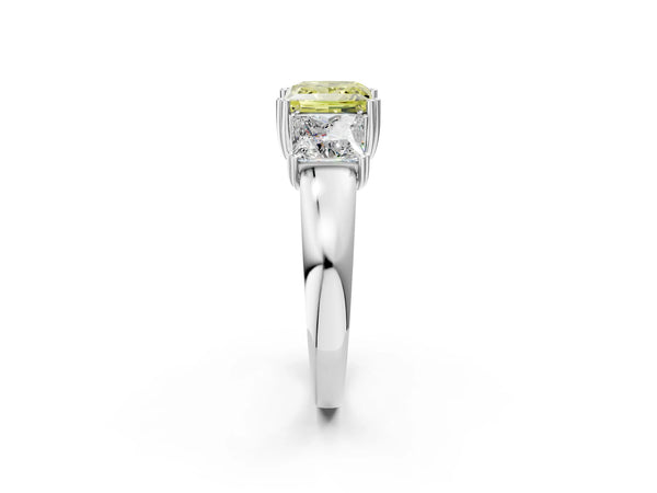 White gold Three-Stone Fancy Yellow Princess Cut Cut Diamond Ring with Channel Set Band and Four-Prong Setting