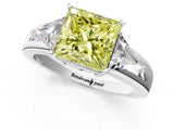 White gold Three-Stone Fancy Yellow Princess Cut Cut Diamond Ring with Trillion Side Stones on a Split Shank Band_1