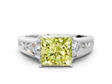 White gold Three-Stone Fancy Yellow Princess Cut Cut Diamond Ring with Trillion Side Stones on a Split Shank Band