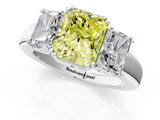 White gold Three-Stone Fancy Yellow Radiant Cut Cut Diamond Ring with Channel Set Band and Four-Prong Setting_37