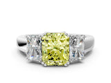 White gold Three-Stone Fancy Yellow Radiant Cut Cut Diamond Ring with Channel Set Band and Four-Prong Setting_60