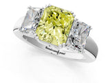 White gold Three-Stone Fancy Yellow Radiant Cut Cut Diamond Ring with Channel Set Band and Four-Prong Setting_61
