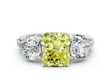 White gold Three-Stone Fancy Yellow Radiant Cut Cut Diamond Ring with Channel-Set Band and Prong Setting