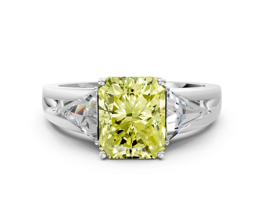 White gold Three-Stone Fancy Yellow Radiant Cut Cut Diamond Ring with Trillion Side Stones on a Split Shank Band