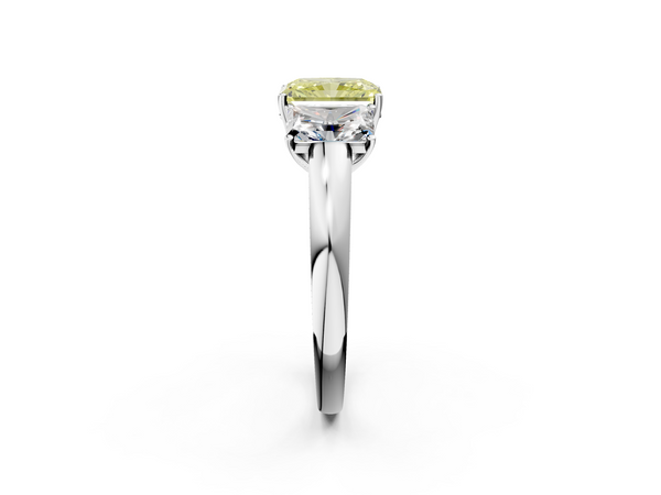 White gold Fancy Yellow Radiant Cut Diamond Three-Stone Ring with Four-Prong Setting and Classic Band