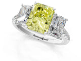 White gold Three-Stone Fancy Yellow Radiant Cut Diamond Ring with Pavé Band and Prong Setting_106